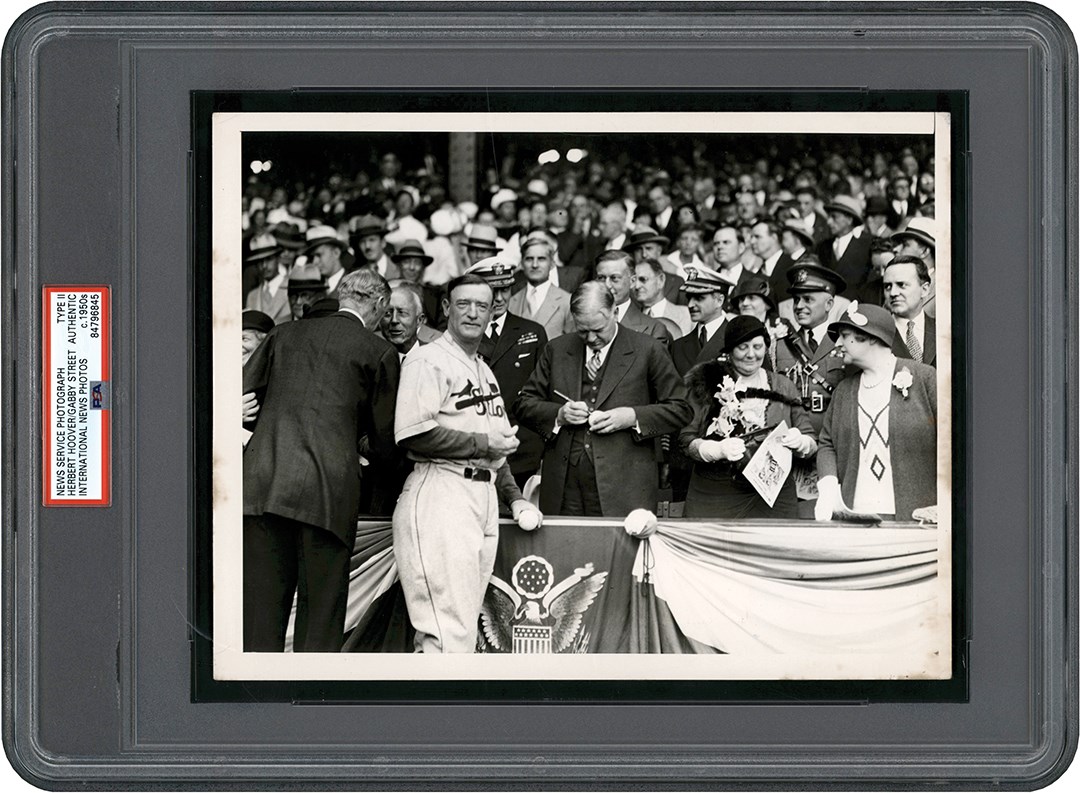 The Brown Brothers Photograph Collection - Herbert Hoover Signs a Ball for Gabby Street at 1931 World Series Photograph (PSA Type II)
