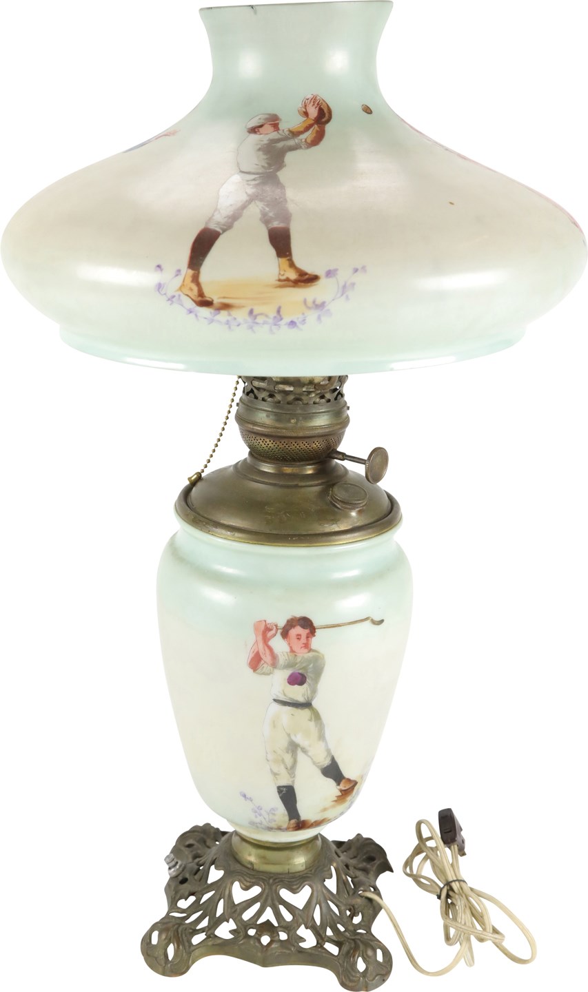 - Circa 1900 Decorative Hand-Painted Glass Lamp with Sports Motif