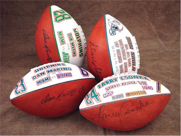 - Miami Dolphins Autographed and Painted Game Footballs (4)