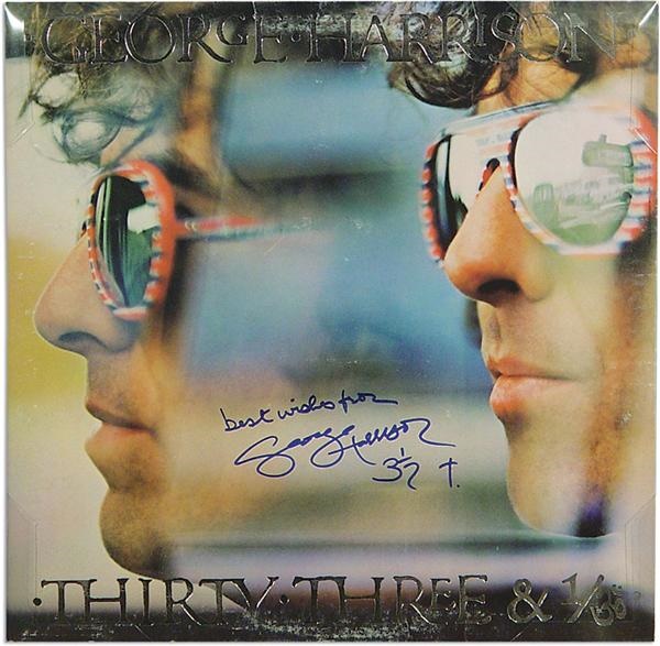 - George Harrison Signed Album