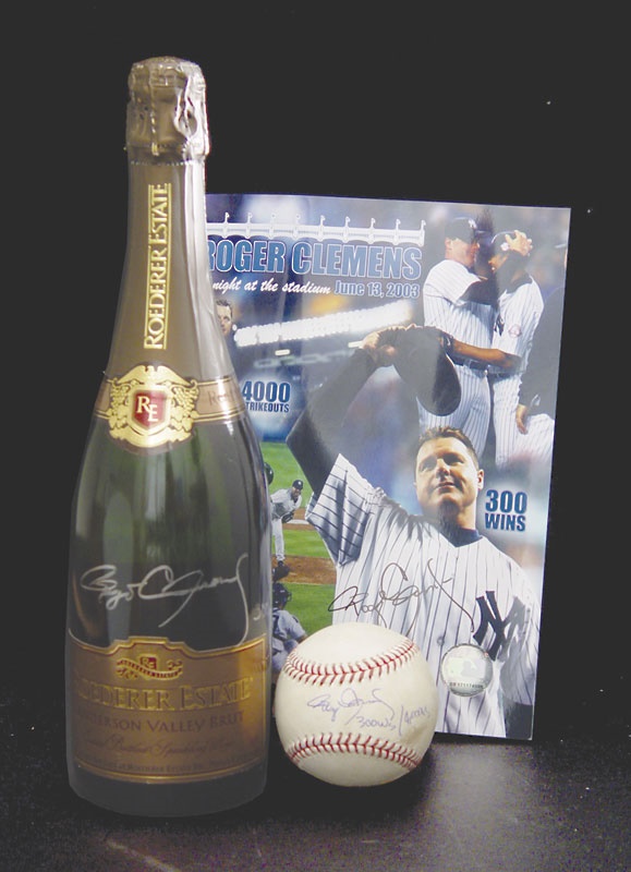 NY Yankees, Giants & Mets - Roger Clemens Commemorative Champagne Bottle and Game Used Baseball from 300th Victory