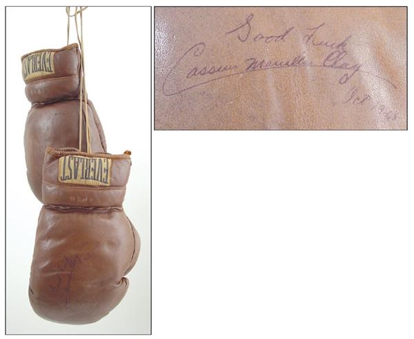 "Cassius Marcellus Clay" Signed Gloves From His First Pro Fight