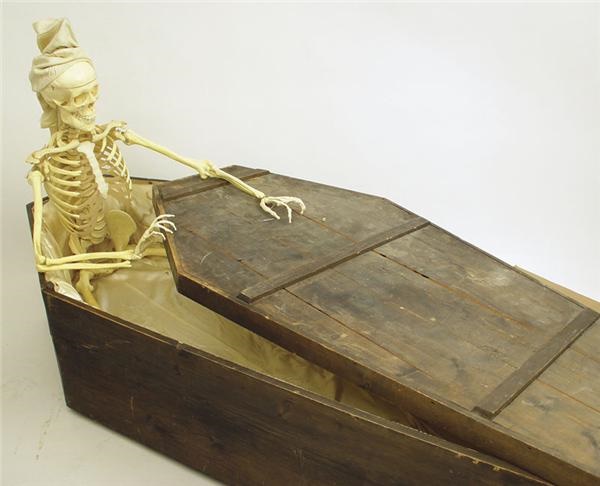 - Universal Studios “Horror” Prop Coffin with Skeleton