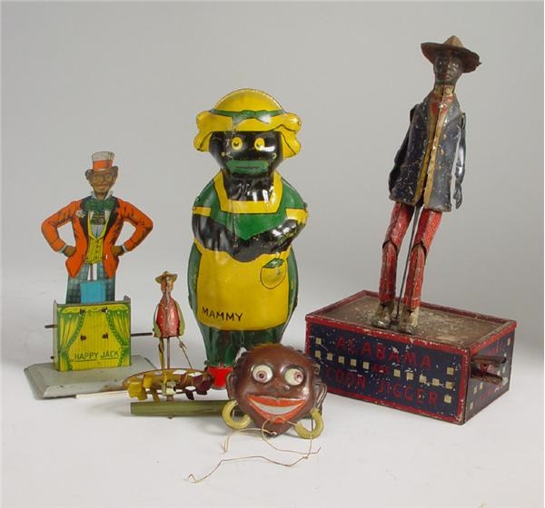 - Early Black Americana Tin Toy Collection (4)