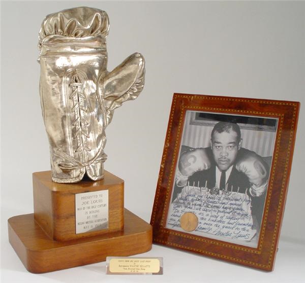- Joe Louis Man of the Half Century Award with Fight Worn Bronzed Glove