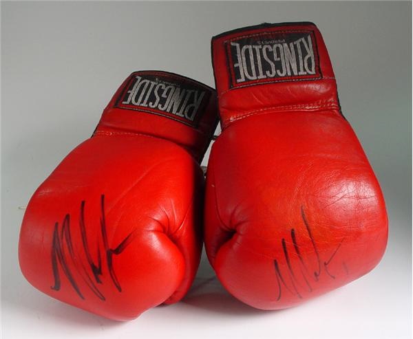 - Mike Tyson Autographed Training Worn Gloves