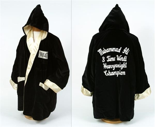 Muhammad Ali - 1981 Muhammad Ali Fight Worn Robe and Trunks Used To Train For Trevor Berbick Fight