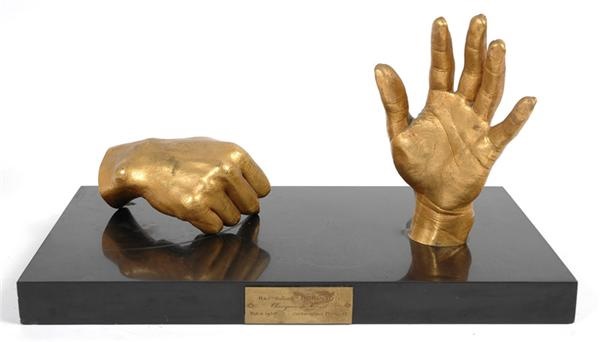 - 1950 Sugar Ray Robinson Signed Hand and Fist Casting