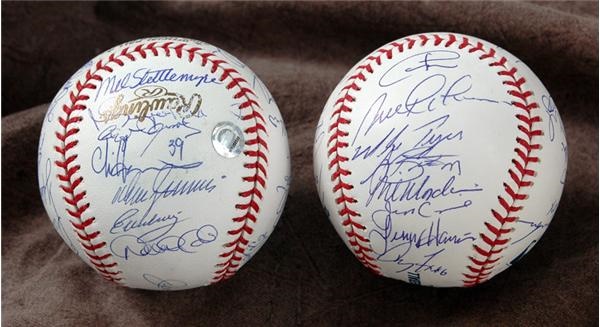 Autographed Baseballs - 2003 Marlins and Yankees Team Signed World Series Baseballs