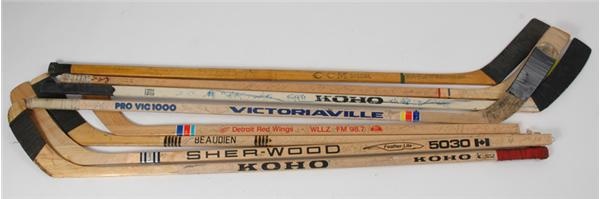 Game Used Team Signed Hockey Stick Collection (8)