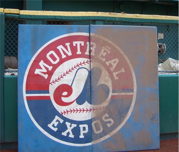 Two Blue Outfield Wall Pads With Expos Logo's