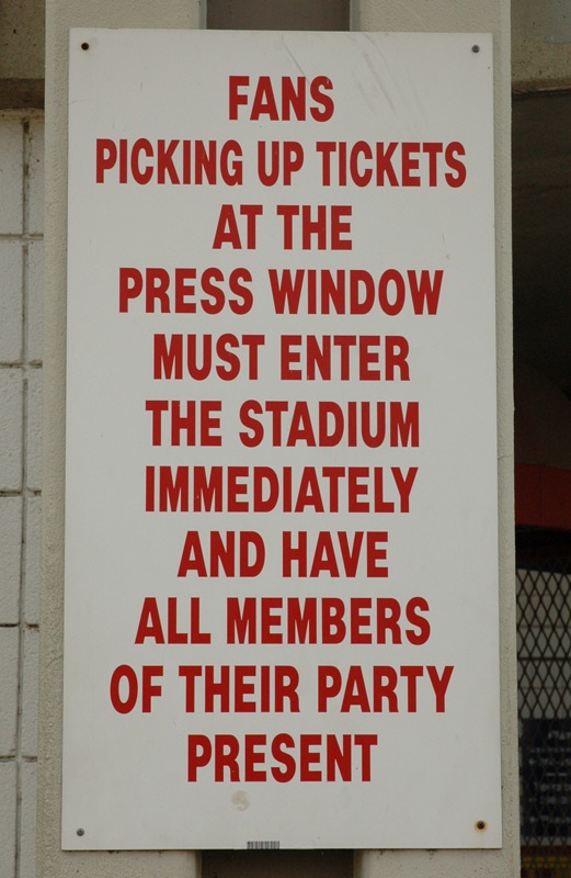 The Facade - Press Window Sign And Ticket Pick Up  Rules Sign