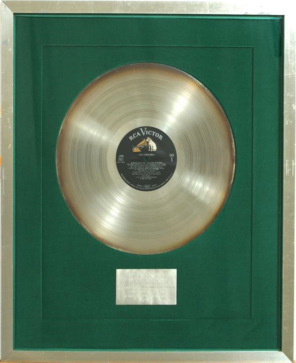 - Girls, Girls, Girls Silver Record from Colonel Parker