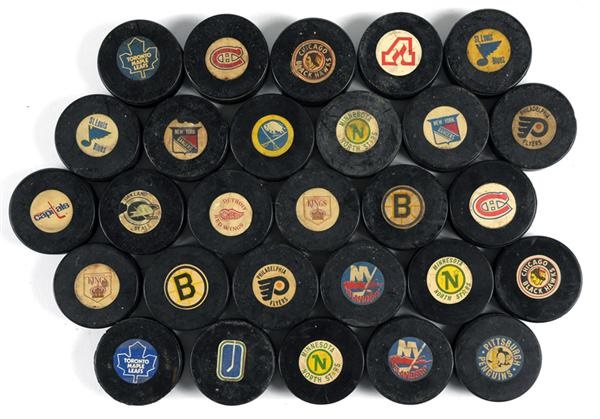 - 28 Vintage Game Used Hockey Pucks From 1960s/70s