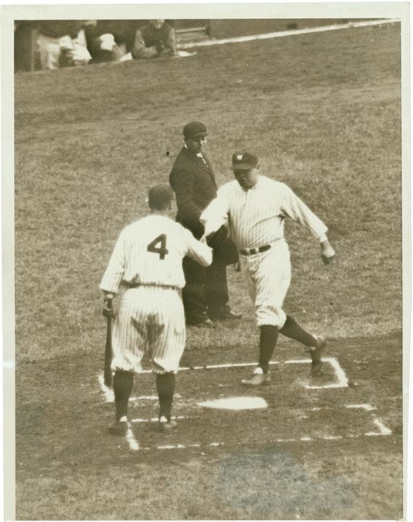 Babe Ruth and Lou Gehrig - Babe Ruth Clouts Home Run