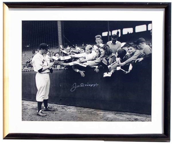 Autographs - Joe DiMaggio Signed 16 x 20'' Photograph of DiMaggio Signing for Fans