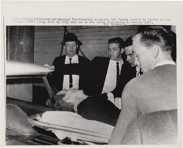 Rock And Pop Culture - Important Oswald Image: He is loaded in ambulance