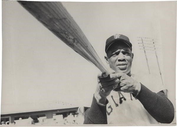 - 1961 Willie Mays Looking Up the Barrel Of His Baseball Bat Photo