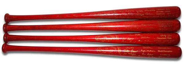 - Collection of (4) Different Cincinnati Reds Championship Red Baseball Bats