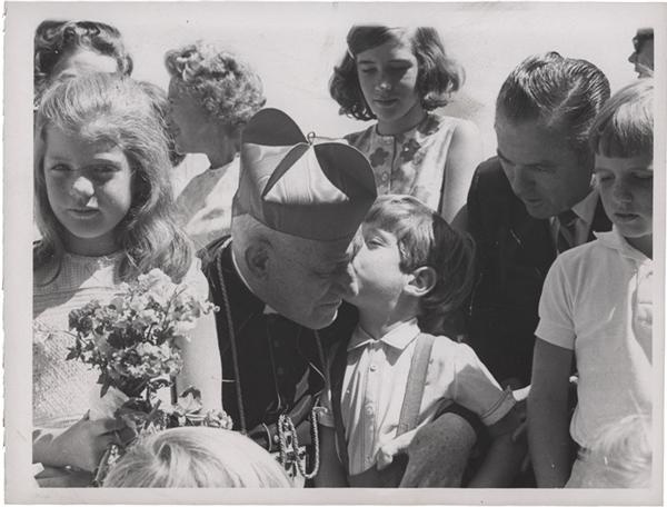 - JFK Jr Kisses Cardinals Cushing Wire Photo (1967)