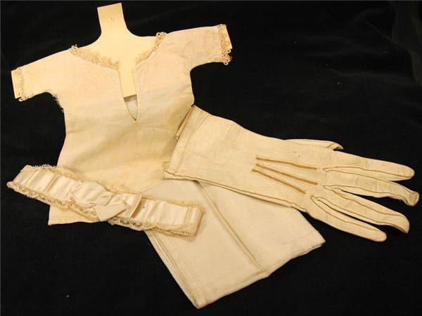 The Dr. James Naismith Collection - Mrs. James Naismith&#39;s Wedding Glove, Garter, Hankerchief and Doll Dress