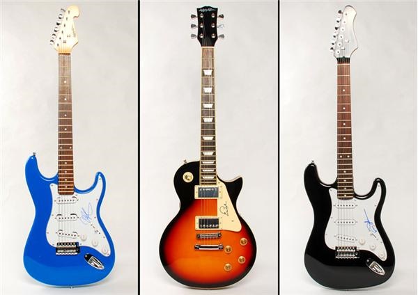 - (3) Les Paul, Eric Johnson, Johnny Lang Signed Electric Guitar Greats Lot