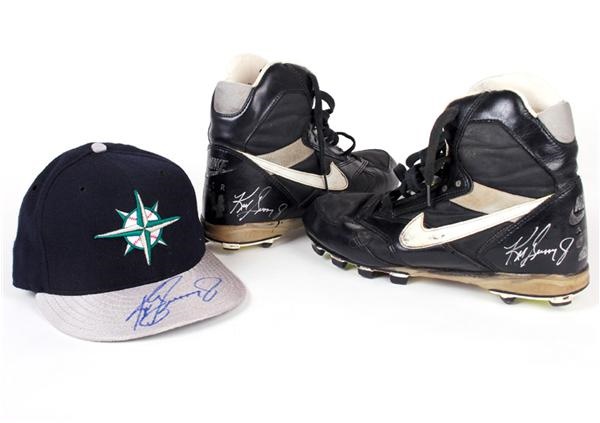 - Ken Griffey Jr Autographed Game Used Hat and Autographed Cleats