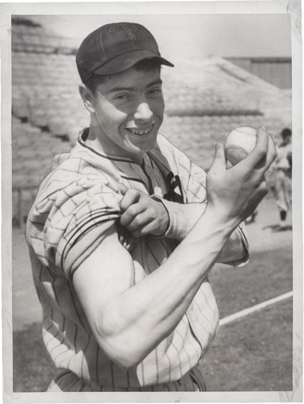 Memorabilia Baseball Photographs - Singles - Joe Dimaggio in the PCL Flexes His Muscles (1936)