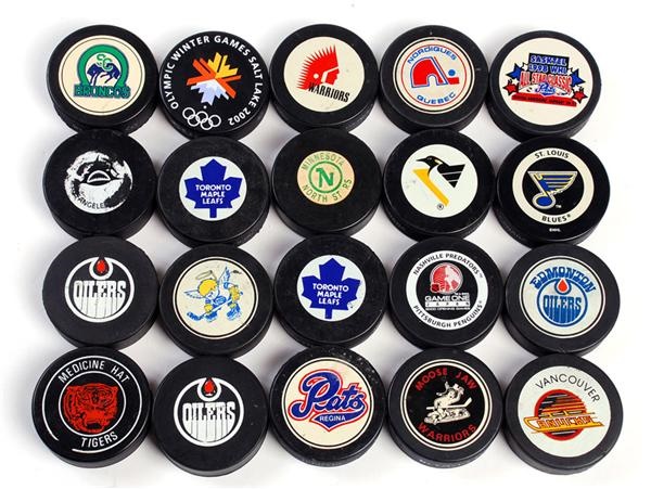 Collection of Hockey Pucks with WHA, NHL and WHL (20)