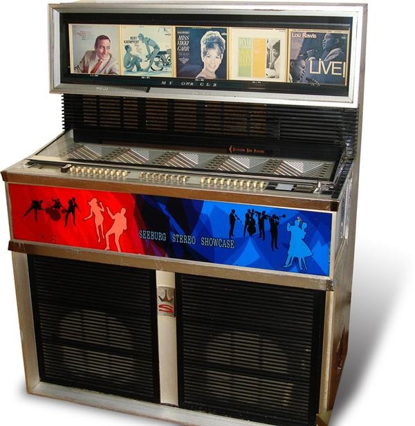 Rock And Pop Culture - Seeburg Stereo Showcase Jukebox With Records (Circa. 1966)