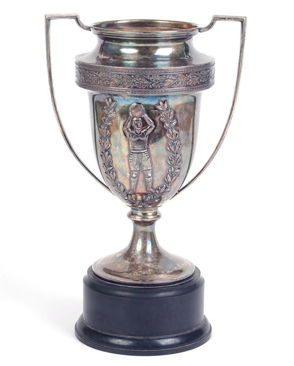 - Graphic 1928 Basketball Silver Trophy with Bakelite Base