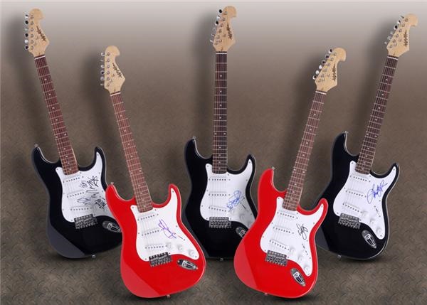 - Collection of Female Musician Signed Guitars (14)