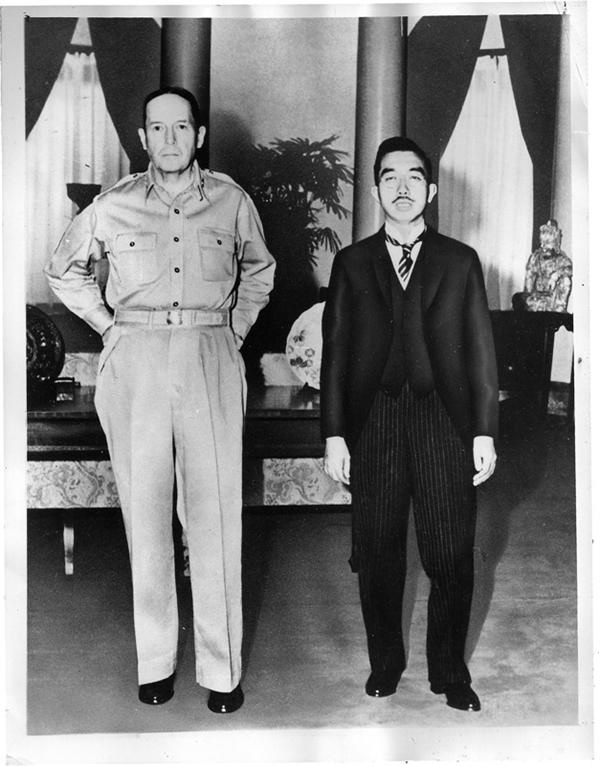 - MACARTHUR & HIROHITO
Two Titans, 1945