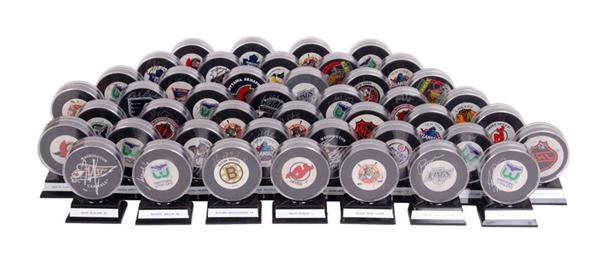 - Massive Collection of Signed Hockey Pucks (1,000+)