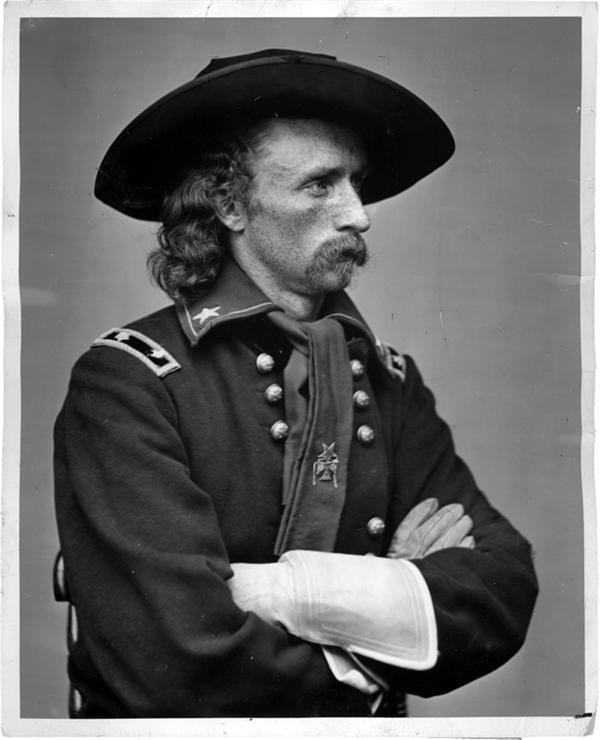 - GEORGE ARMSTRONG CUSTER 
(1839-1876)<br>By Mathew Brady, 1870s