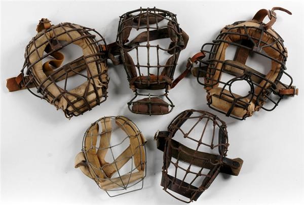 Five Styles of Catchers Masks From 1890's-1930's and One Mitt