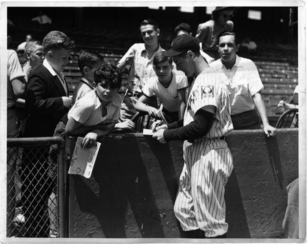 Babe Ruth and Lou Gehrig - Lou Gehrig Signs for Fans