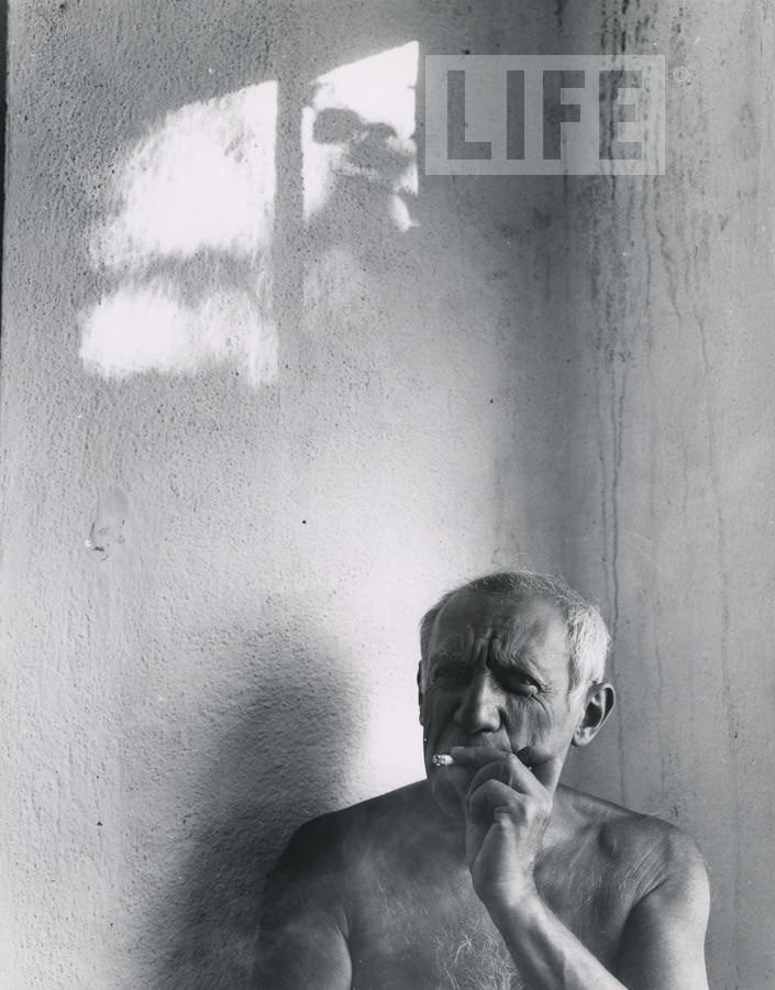 - Pablo Picasso Smoking A Cigarette by Gjon Mili (1904 - 1984)