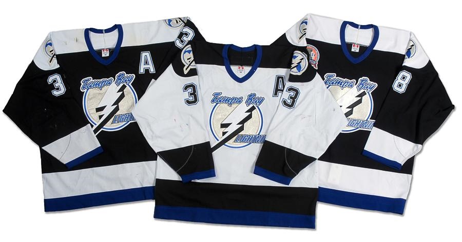 2002-03 Fredrik Modin Home & Road and 2004 Darren Rumble Stanley Cup Finals Tampa Bay Lightning Game Worn & Issued Jerseys (3)