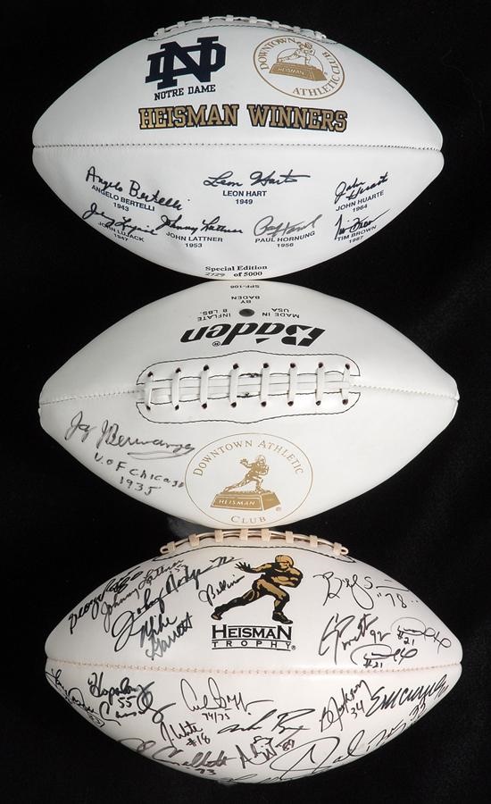 - Collection of 3 Signed Heisman Footballs Including Heisman Trophy Football with 28 Signatures