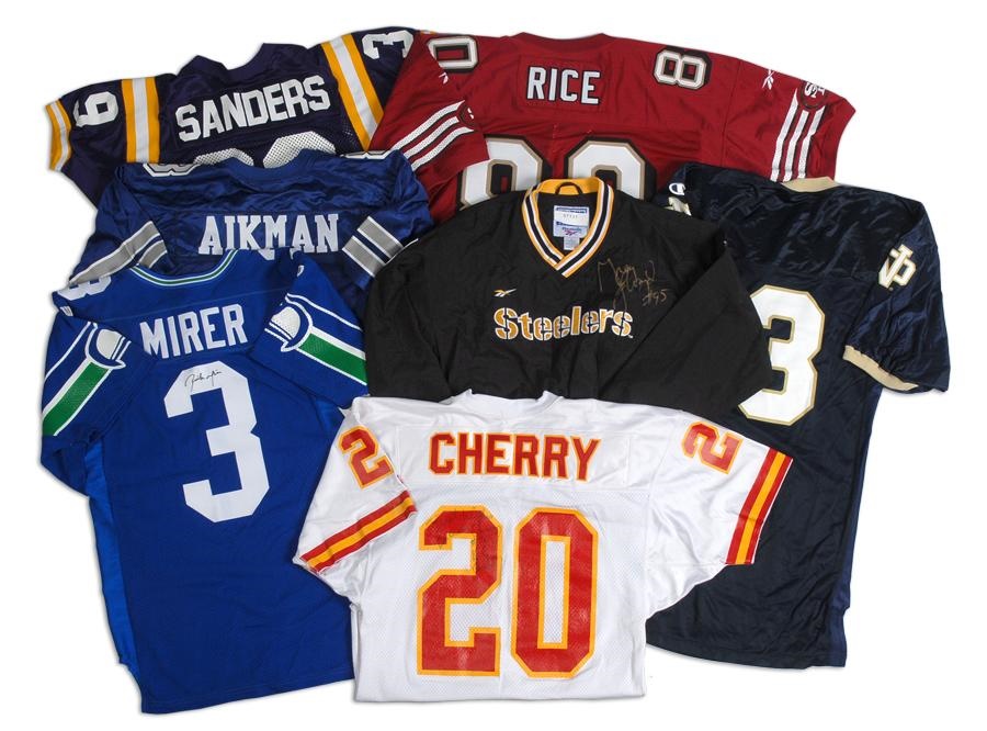 - Collection of Signed Football Helmets and Jerseys
