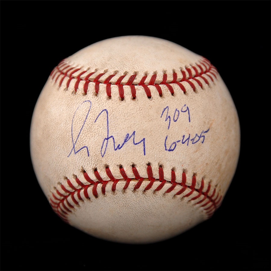 - Greg Maddux 309th Win Signed Game Used Baseball