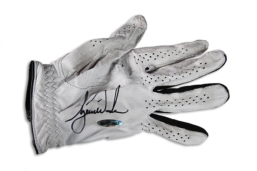 - Tiger Woods Signed Tournament Used Golf Glove (UDA)
