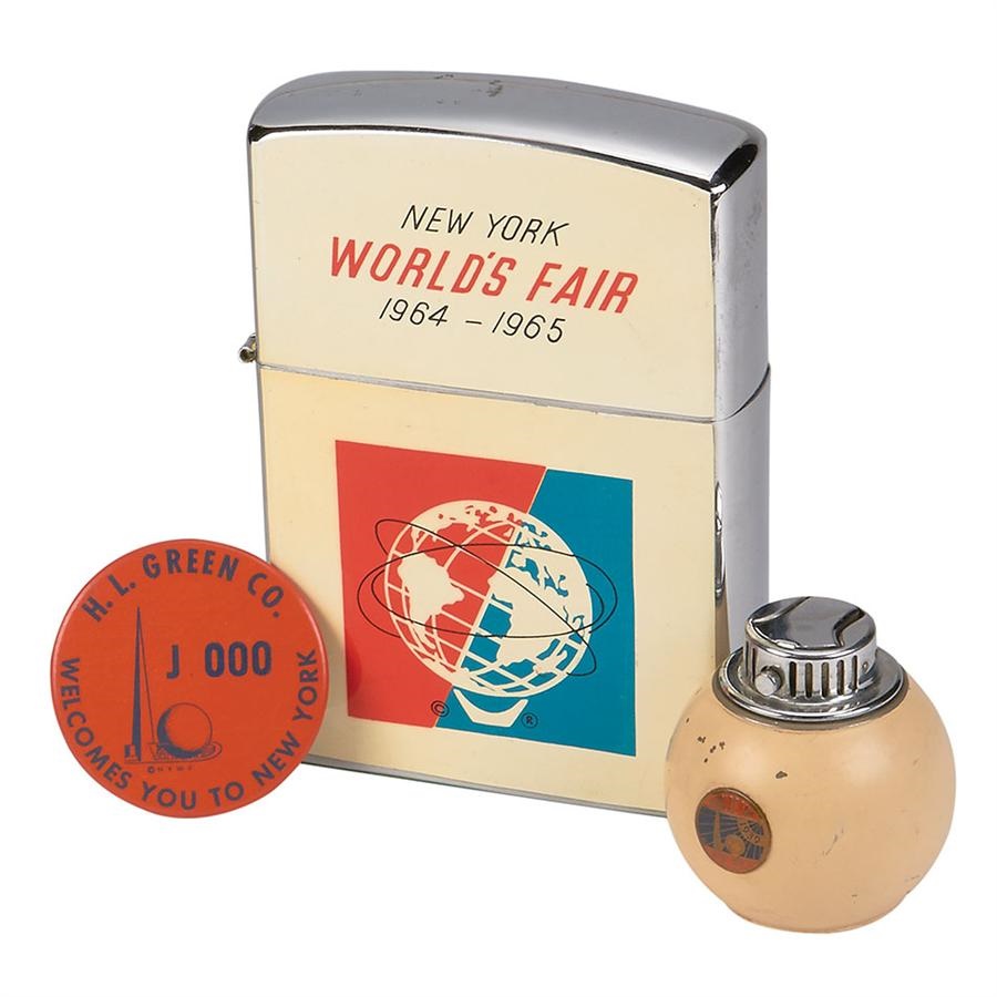 - 1964 & 1939 New York World's Fair Table Lighters and Rare Pavilion Badge (3)