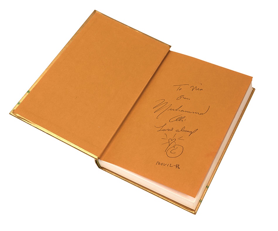- Muhammad Ali Signed and Incribed Book "Prayer and Al-Islam"