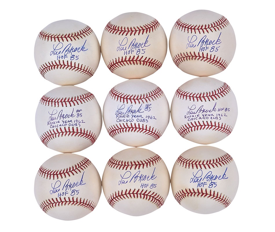 Two Dozen Lou Brock Single-Signed Baseballs with Notations