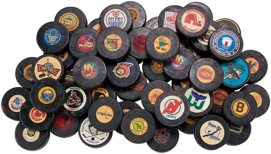 Dave Brewer Hockey Collection - 1960's-80's NHL & WHA Puck Collection (52)