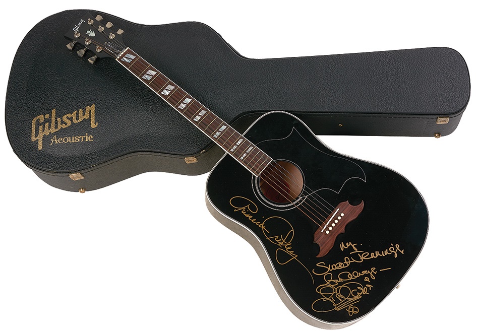 - Lisa Marie & Priscilla Presley Signed Guitar