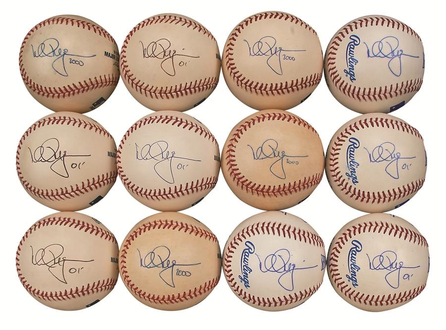 One Dozen Mark McGwire Single Signed Baseballs