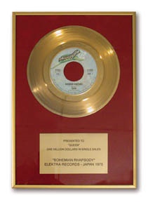 - Queen Presented Gold Record Award
